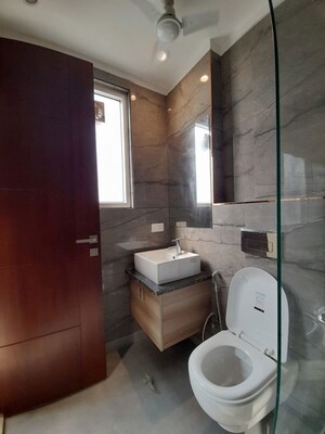 Bathroom in 3 BHK Builder Floor at South Extension I – for Sale