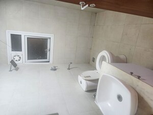 Bathroom in 3.5 BHK Apartment at Bhartiya Nikoo Homes, Thanisandra Main Road – for Rent