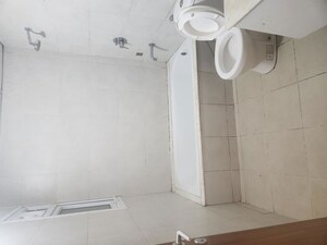 Bathroom in 3.5 BHK Apartment at Bhartiya Nikoo Homes, Thanisandra Main Road – for Rent