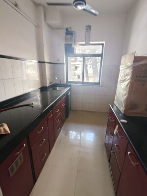 Kitchen in 1 BHK Apartment at Spring Leaf 6 CHS, Kandivali East – for Rent