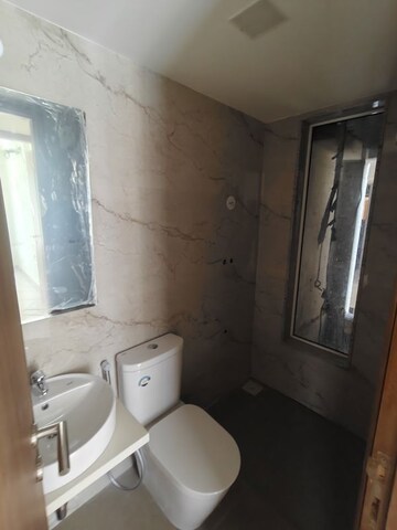 Bathroom in 1 BHK Apartment at Srishti Oasis Phase I, Bhandup West – for Sale