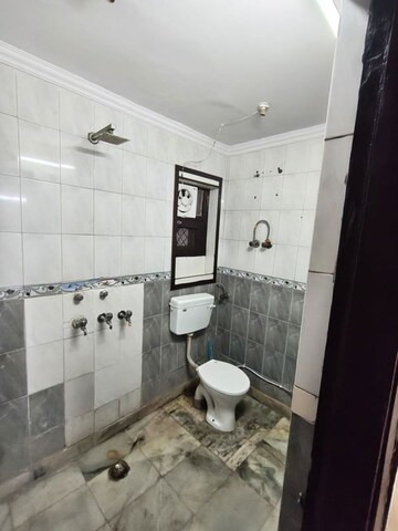 Bathroom in 3 BHK Apartment at Rohini Sector 13 – for Sale