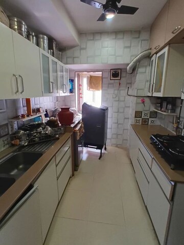 Kitchen in 3 BHK Apartment at Lokhandwala Whispering Palms XXclusives, Kandivali East – for Rent