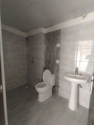 Bathroom in 3 BHK Apartment at Gulshan Bellina, Sector 16 Greater Noida – for Rent