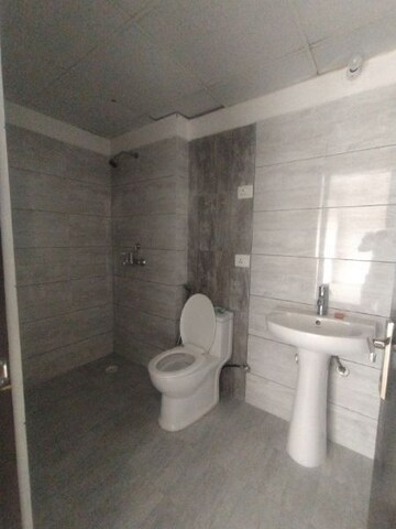 Bathroom in 3 BHK Apartment at Gulshan Bellina, Sector 16 Greater Noida – for Rent