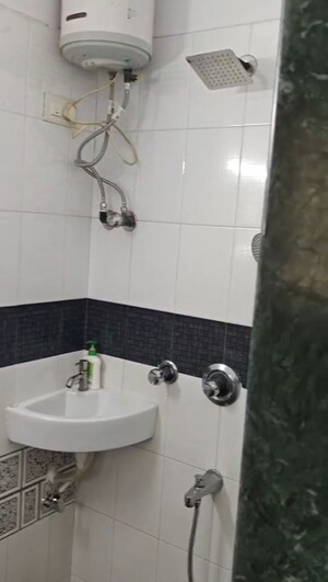 Bathroom in 3 BHK Apartment at Gemstar Nestle Apartments, Malad West – for Rent