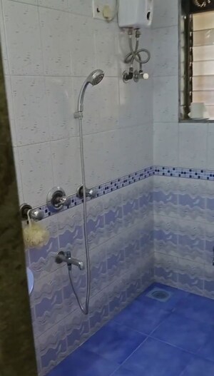 Bathroom in 3 BHK Apartment at Gemstar Nestle Apartments, Malad West – for Rent