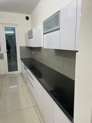 Kitchen in 3 BHK Apartment at Paradigm Business Hermitage Park, Dhakoli – for Sale