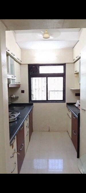 Kitchen in 2 BHK Apartment at Shree Vallabh Tower, Malad West – for Sale