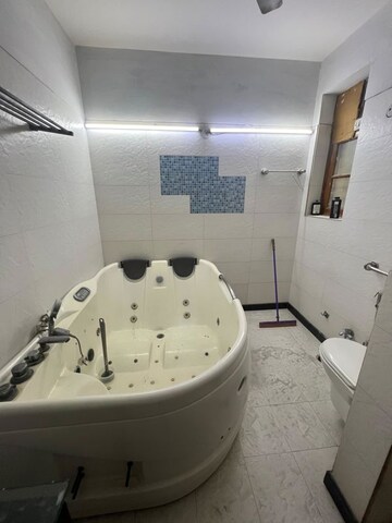 Bathroom in 5 BHK Apartment at Rohini Sector 13 – for Sale