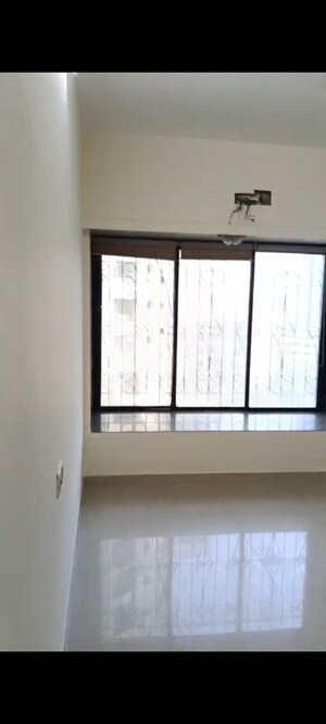 Room in 2 BHK Apartment at Shree Vallabh Tower, Malad West – for Sale