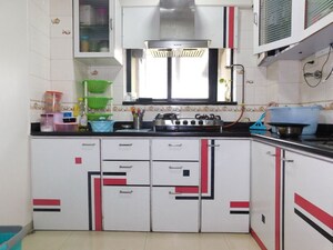 Kitchen in 2 BHK Apartment at Shivam Shankaram Residency, Chembur – for Sale