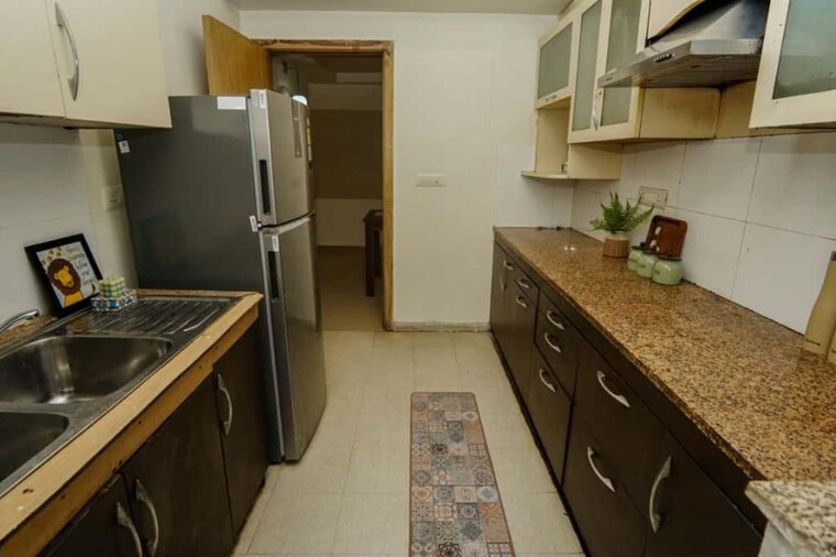 Kitchen, dlf-new-town-heights-iii 3.5 Bedroom 1930 Sq.Ft. Apartment In Sector 91 Gurgaon 10013197