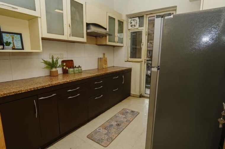 Kitchen, dlf-new-town-heights-iii 3.5 Bedroom 1930 Sq.Ft. Apartment In Sector 91 Gurgaon 10013197