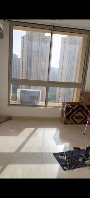 Living Room in 2 BHK Apartment at Hiranandani Delanna, Ghodbunder Road – for Rent