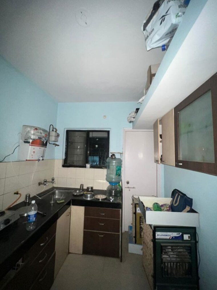 Kitchen, aswani-rose-garden 2 Bedroom 800 Sq.Ft. Apartment In Viman Nagar Pune 10013218