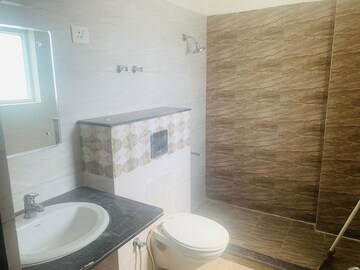 Bathroom in 3 BHK Apartment at NK Sharma Savitry Greens, Lohgarh – for Rent