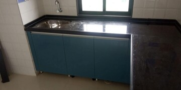 Kitchen in 1 BHK Apartment at Raunak Unnathi Greens, Kasarvadavali – for Rent