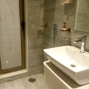 Bathroom in 2 BHK Apartment at Crystal Hitendra Dhamm Shabha CHS, Goregaon West – for Sale