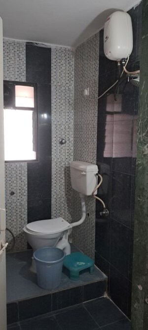 Bathroom in 3 BHK Apartment at Sanskruti Arcade, Wakad – for Rent