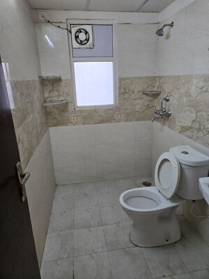 Bathroom in 3 BHK Apartment at Amrapali Golf Homes, Sector 4 Greater Noida – for Sale