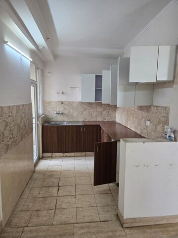 Kitchen in 3 BHK Apartment at Amrapali Golf Homes, Sector 4 Greater Noida – for Sale