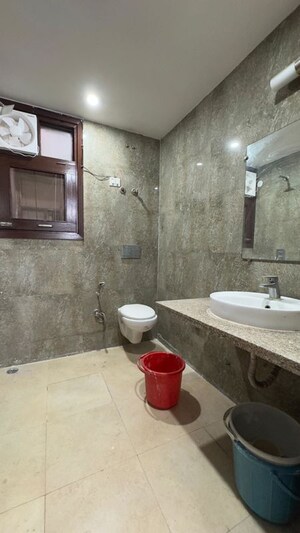 Bathroom in 2.5 BHK Builder Floor at Chattarpur – for Rent