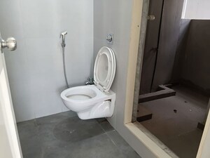 Bathroom in 1 BHK Apartment at Vihang Valley Phase 3, Kasarvadavali – for Rent
