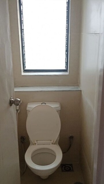 Bathroom in 2 BHK Apartment at Runwal Gardens, Dombivli East – for Rent