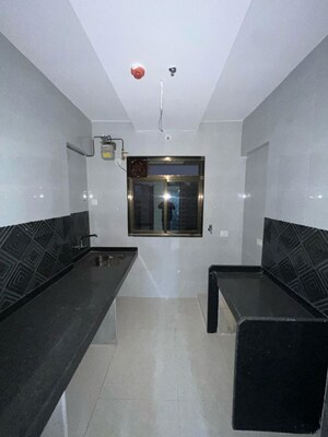 Kitchen in 1 BHK Apartment at Runwal Garden City, Balkum Pada – for Rent