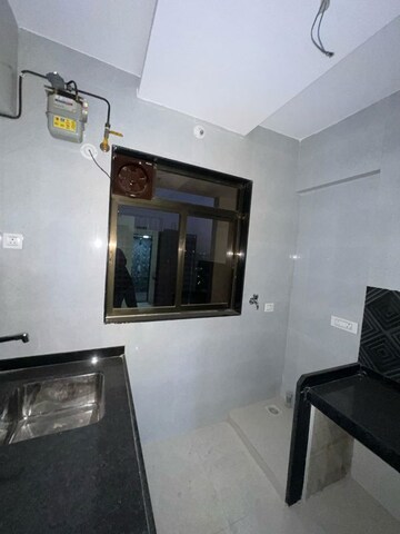 Kitchen in 1 BHK Apartment at Runwal Garden City, Balkum Pada – for Rent