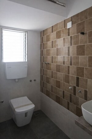 Bathroom in 2 BHK Apartment at Rajlaxmi Nakshatra Auris, Nalasopara West – for Sale