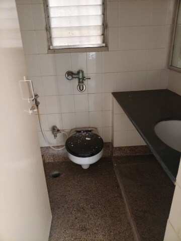 Bathroom in 2 BHK Apartment at Kalpa Taru Siddhachal III, Vasant Vihar – for Sale