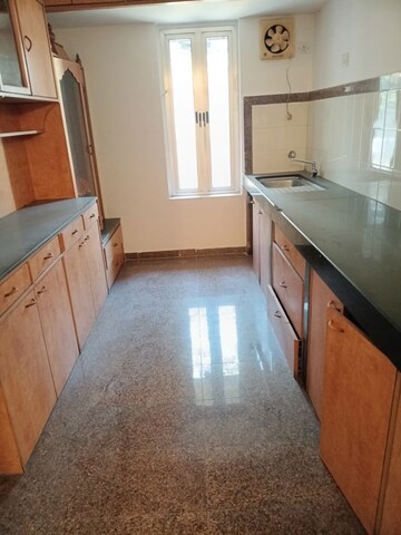 Kitchen in 2 BHK Apartment at Kalpa Taru Siddhachal III, Vasant Vihar – for Sale