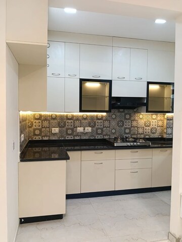 Kitchen in 2.5 BHK Apartment at Smart World Gems, Sector 89 – for Rent