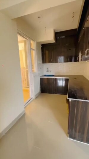 Kitchen in 2 BHK Apartment at BSB Vaibhav Heritage Height, Sector 16 Greater Noida – for Sale