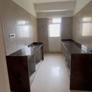 Kitchen in 3 BHK Apartment at Ashray Group Jaswanti Gold, Kailash Nagar – for Sale