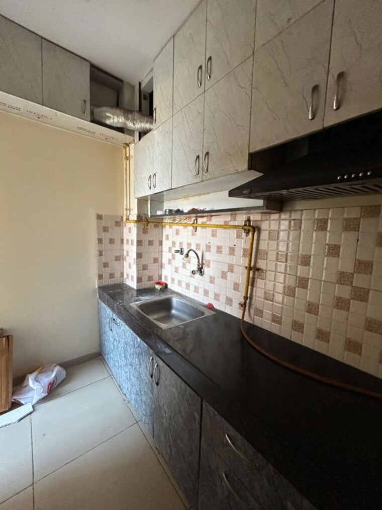Kitchen, wave-dream-homes 2 Bedroom 808 Sq.Ft. Apartment In Wave City Ghaziabad 10014004