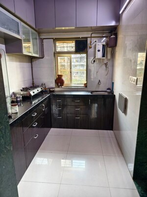 Kitchen in 2.5 BHK Apartment at Neema Sharda Heights, Andheri East – for Sale