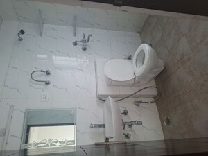 Bathroom in 2.5 BHK Apartment at Amrapali Heartbeat City, Sector 107 – for Rent