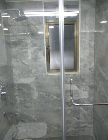 Bathroom in 4 BHK Apartment at Dynamix Woodlands Apartment, Malad East – for Sale