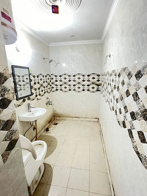 Bathroom in 1 BHK Apartment at Orchid Island, Sector 51 – for Rent