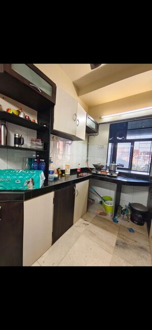 Kitchen in 2 BHK Apartment at Acme Enclave, Malad West – for Rent