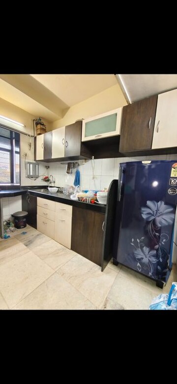 Kitchen in 2 BHK Apartment at Acme Enclave, Malad West – for Rent