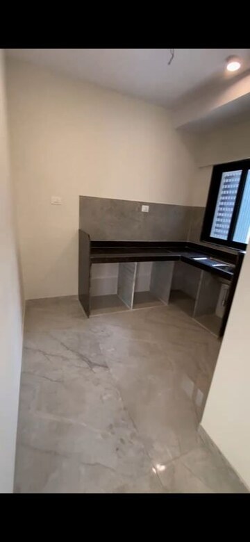 Kitchen in 2 BHK Apartment at Ajmera Boulevard, Malad West – for Rent