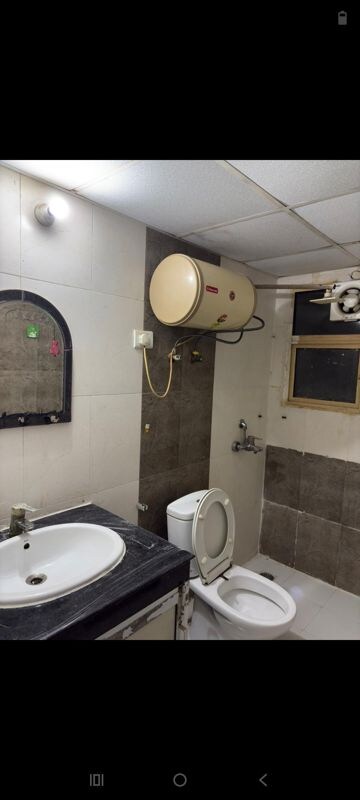Bathroom in 3 BHK Apartment at Nimbus The Hyde park, Sector 78 – for Rent