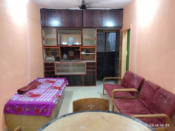 Living Room in 2 BHK Apartment at Vile Parle West – for Sale