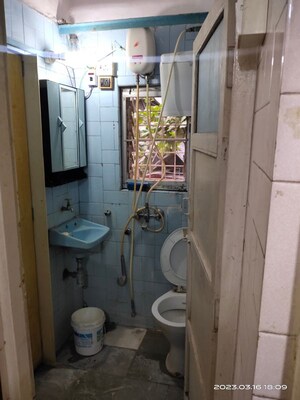 Bathroom in 2 BHK Apartment at Vile Parle West – for Sale