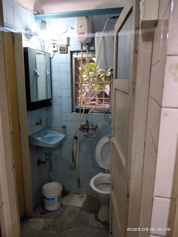 Bathroom in 2 BHK Apartment at Vile Parle West – for Sale