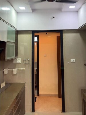 Kitchen in 2 BHK Apartment at Dosti Group Imperia, Manpada – for Rent